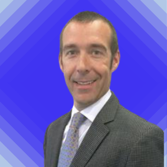 Image of Paul Lakin with blue brilliance behind