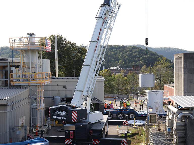 Equipment being moved by a crane