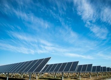 Solar panels under a blue sky